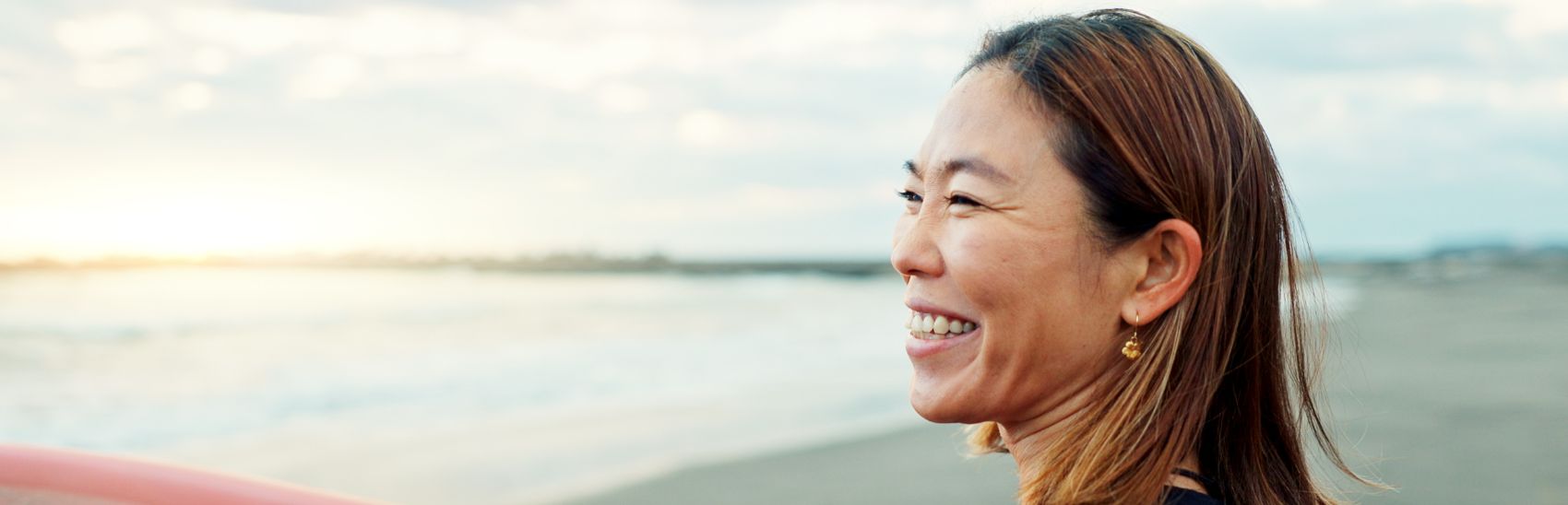 A lady on the beach, finally experiencing relief from pain.
