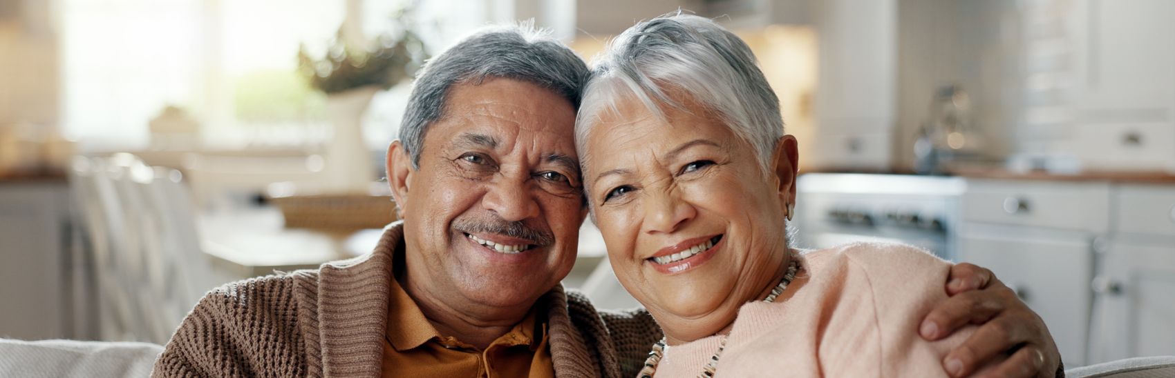 A couple smiling with no more pain.